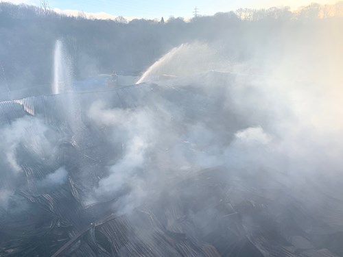 Dampening down the collapsed commercial structure