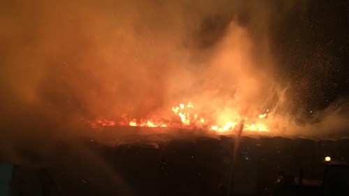The fire late at night in a dark field near Hooten Lane, Leigh