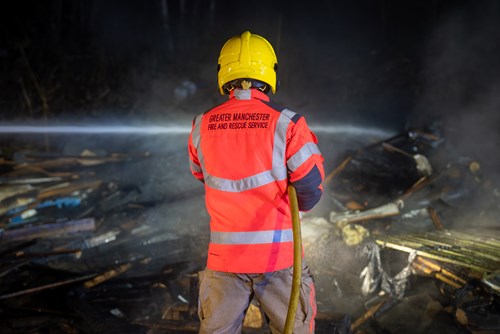 Firefighter tackling a fire